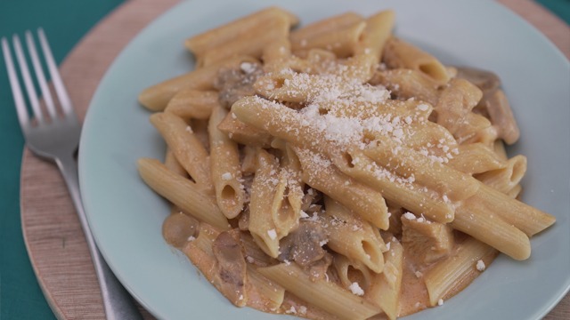Timbal or creamy tomato chicken pasta on a plate