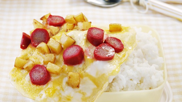 fish hotdog potato omelet over rice