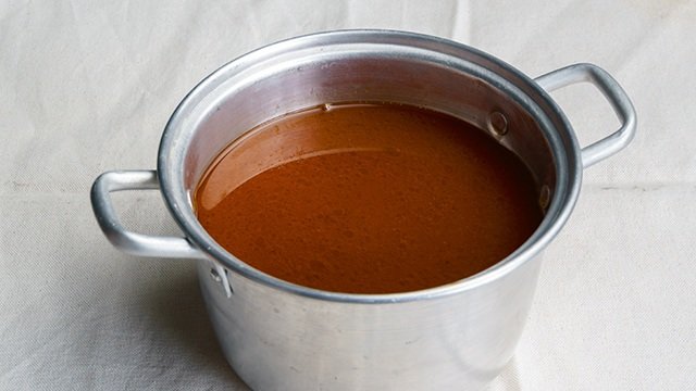 beef or pork stock in a stainless pot