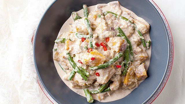 smoky ginataang gulay in a gray plate