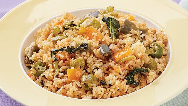 sinangag flavored fried rice or sinangag na sinigang rice in a shallow yellow bowl