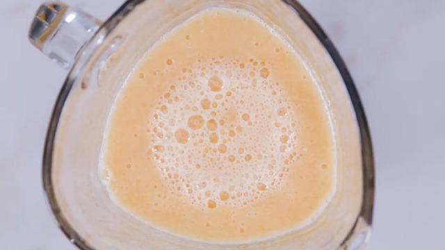 melon liquified into a juice in a blender