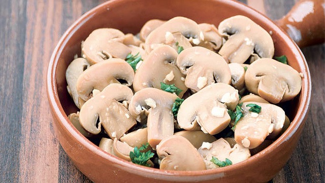 buttered and sauteed button mushrooms