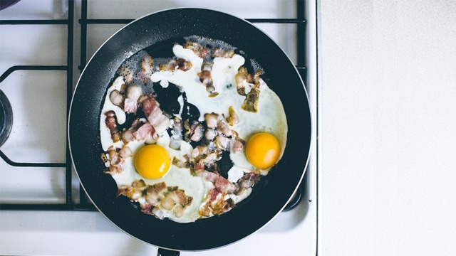 eggs and bacon in a nonstick pan