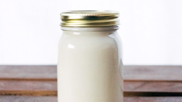 This jar contains the super creamy dairy product, evaporated milk.