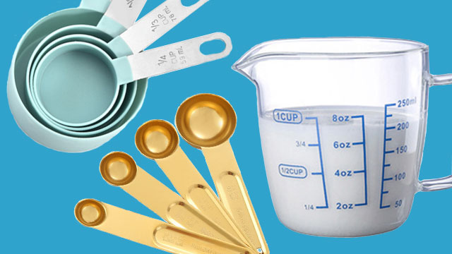 measuring tools on a blue background: measuring cups, measuring spoons, liquid measuring cup