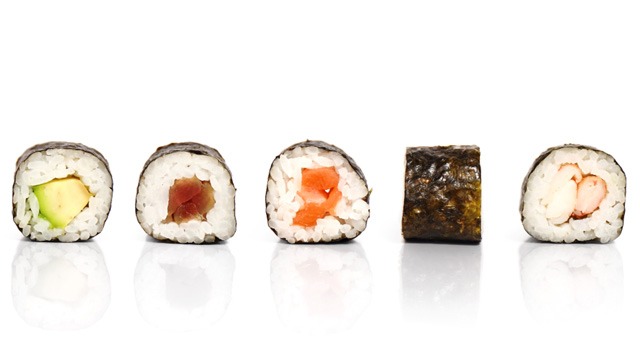different kinds of sushi in a row