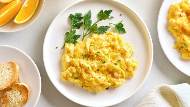 scrambled eggs on a white plate