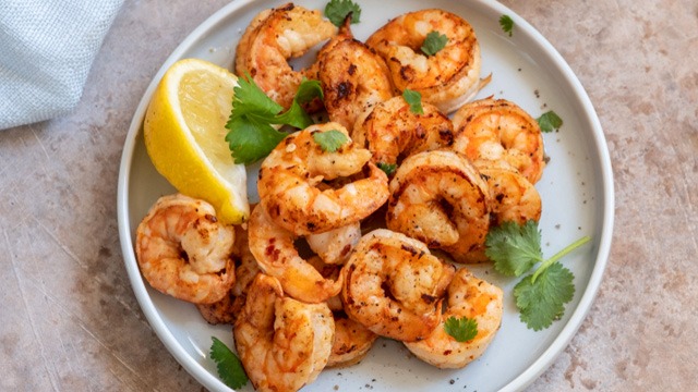 plump seared shrimp peeled deveined and served with lemon wedge and parsley