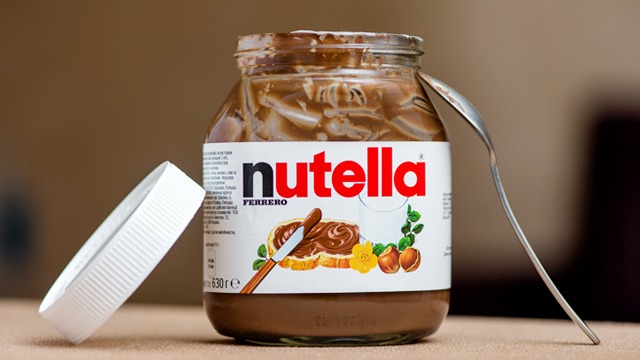 open nutella jar with spoon