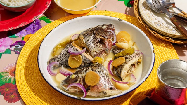 Paksiw na tilapia in a white plate