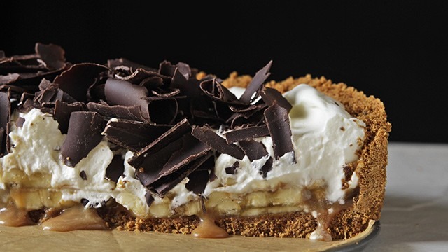 banoffee pie with graham crust whipped cream caramel bananas and shaved chocolate