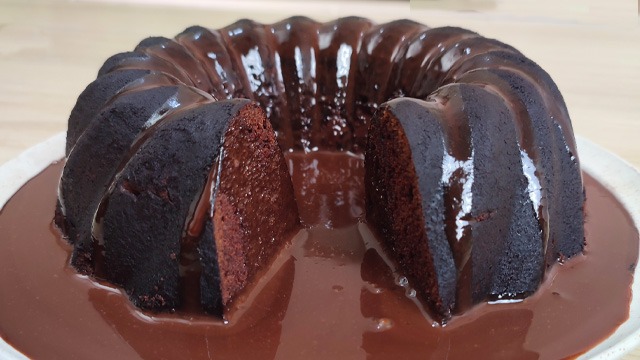 giant chocolate lava cake with chocolate ganache puddle