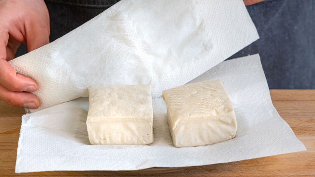 tofu or tokwa blocks on paper towels