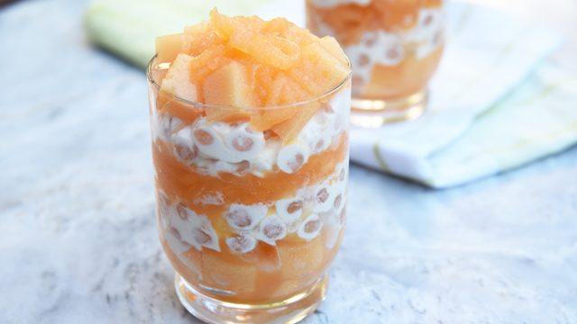 Melon sago layered in a clear glass cup