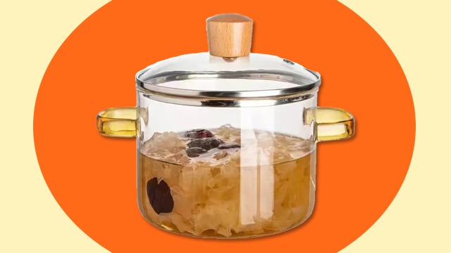 glass cooking pot with ingredients in the water