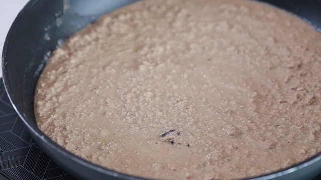 cooking the pureed liver in a pan