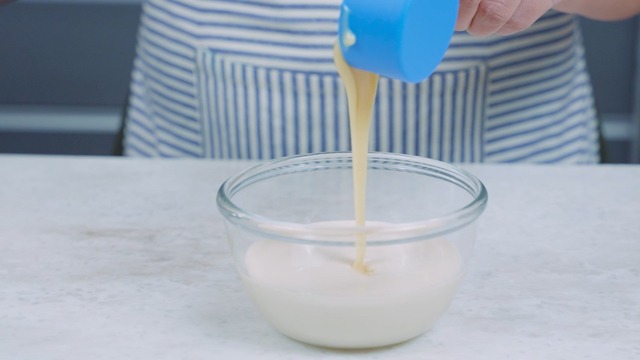 adding condensed milk to evaporated milk