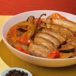 lechon kawali in a bagoong sauce with gata recipe image closeup