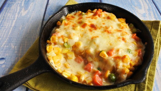 corn cheese in cast iron pan