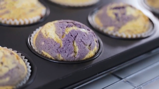 ube and cheese cupcakes still in the cupcake pan fresh from the oven