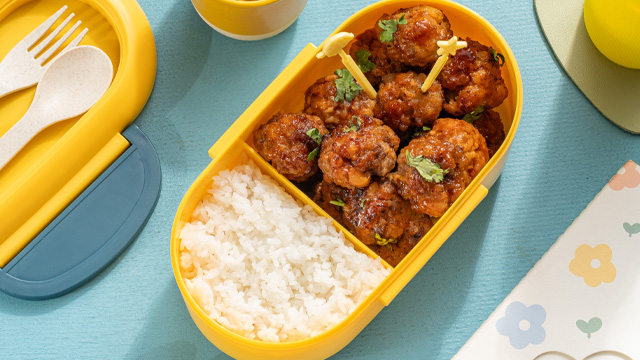 meatballs in filipino pork barbecue sauce with rice