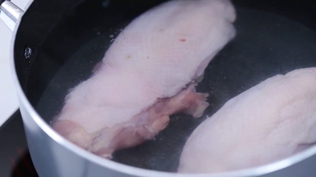 chicken backs simmering to make broth