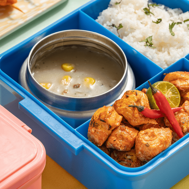 saja bento box blue with soup and chicken insasal inside