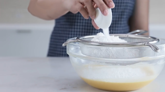 dump dry ingredients into a strainer over your bowl