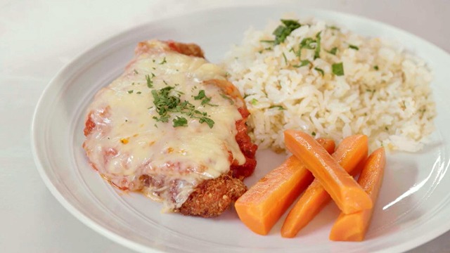 chicken parmigiana plate with garlic fried rice and butter carrots ala banapple