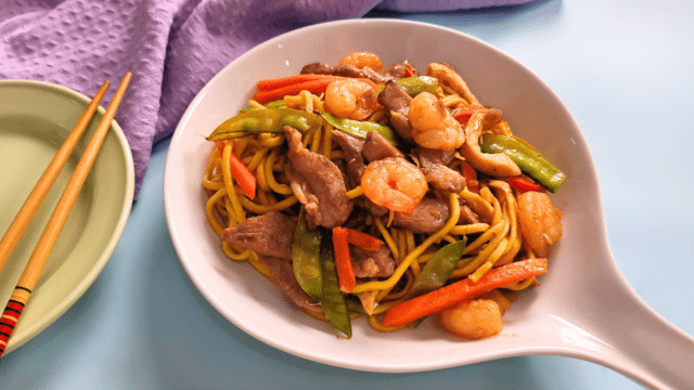 pancit chami in a white serving plate